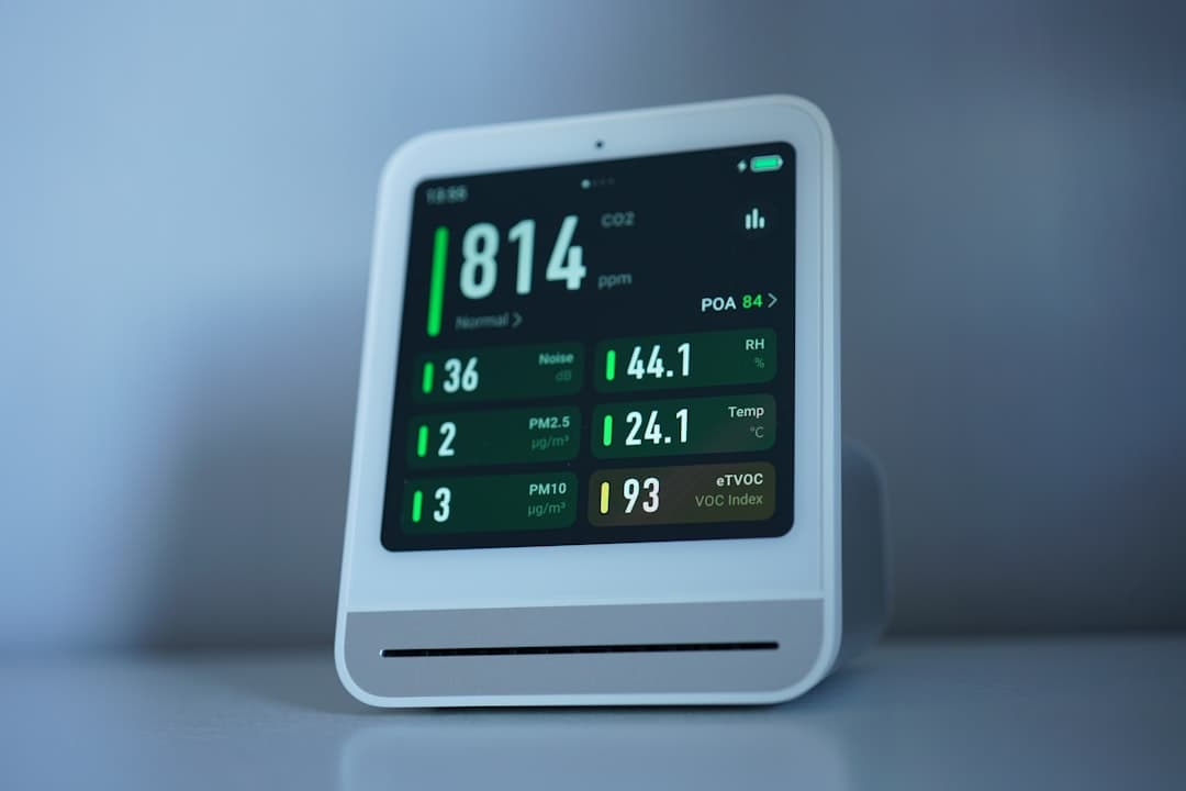 Healthcare professional using AI-powered diagnostic tools, with medical data visualizations and patient monitoring systems